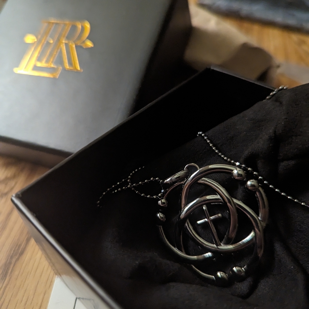 Lisa Robertson Perseverance Black intertwining cross and circle necklace